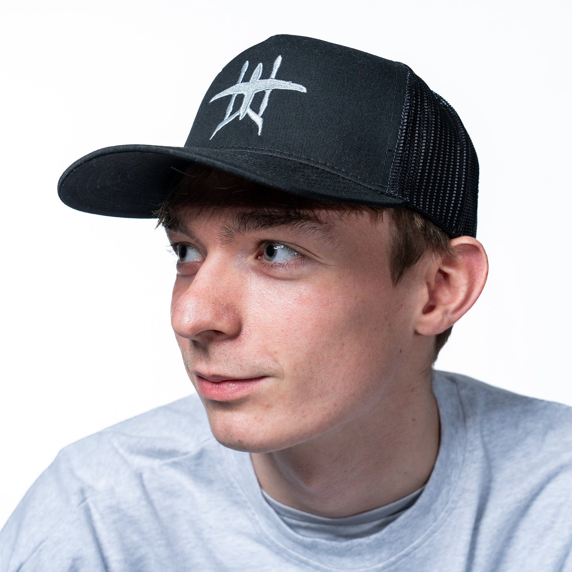 Black ALIA Trucker Hat